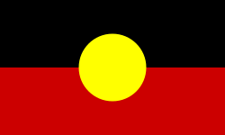 The Australian Aboriginal Flag, created by a private Australian citizen, was deleted from Commons because of how it was copyrighted at the time. (A similar design in the United States would likely not have been eligible for copyright protection, for being simple geometry.)